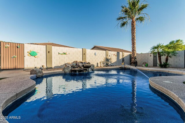16077 W Anasazi St, Goodyear, AZ 85338 - view of pool with a fenced backyard