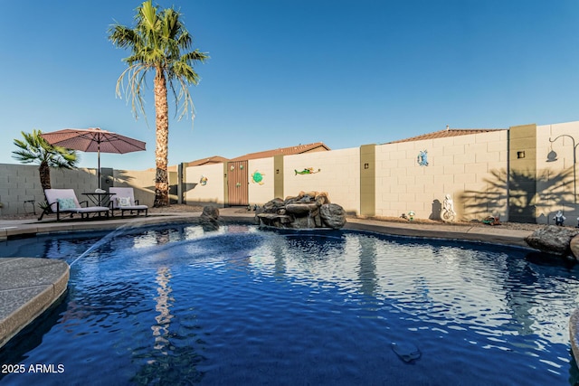 16077 W Anasazi St, Goodyear, AZ 85338 - view of pool featuring a fenced backyard