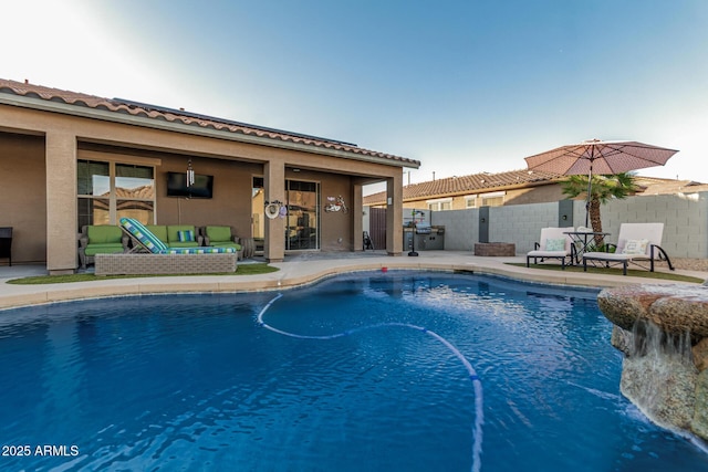 16077 W Anasazi St, Goodyear, AZ 85338 - view of swimming pool with a patio area and an outdoor hangout area