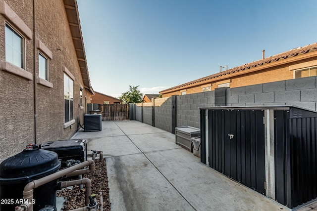 16077 W Anasazi St, Goodyear, AZ 85338 - fenced backyard with a patio