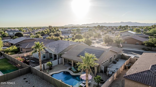 16077 W Anasazi St, Goodyear, AZ 85338 - aerial view of residential area featuring a pool area and a mountain backdrop