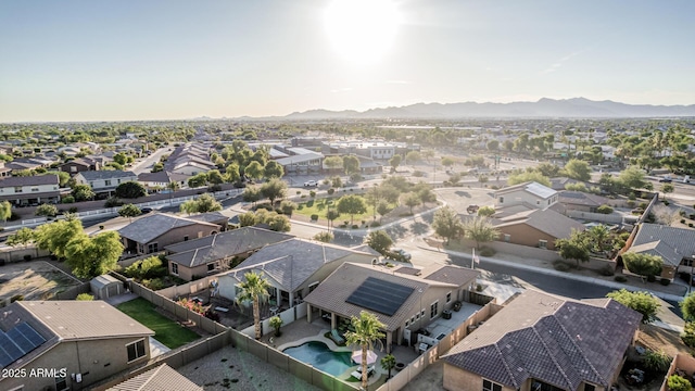 16077 W Anasazi St, Goodyear, AZ 85338 - aerial view of residential area with a mountain backdrop and a pool