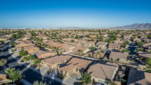 16077 W Anasazi St, Goodyear, AZ 85338 - aerial overview of property's location featuring nearby suburban area and a mountain backdrop