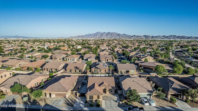 16077 W Anasazi St, Goodyear, AZ 85338 - aerial overview of property's location featuring nearby suburban area and a mountainous background