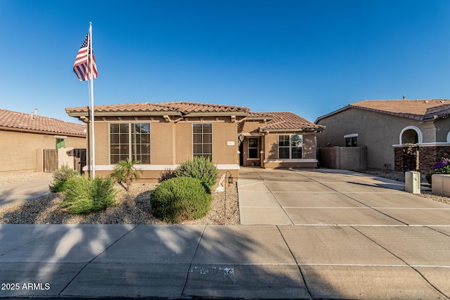 16077 W Anasazi St, Goodyear, AZ 85338 - view of front of property featuring stucco siding and a tiled roof