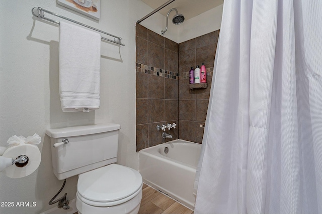 bathroom with toilet and shower / tub combo with curtain