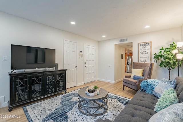 living room featuring light wood-type flooring