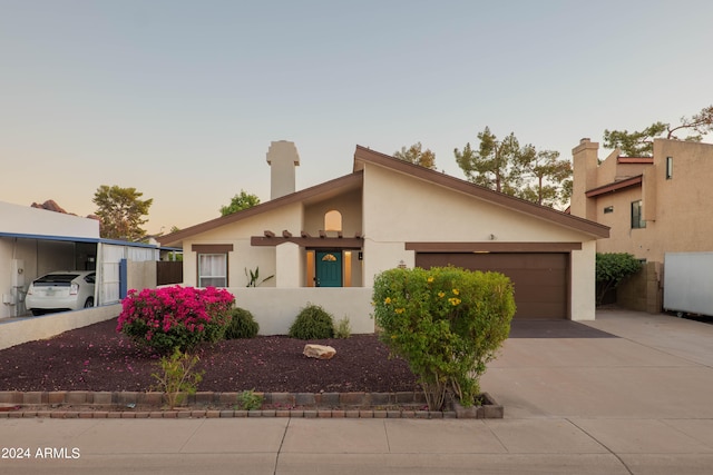 view of front of house with a garage