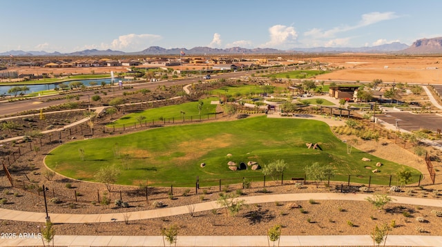 aerial perspective of suburban area with a water and mountain view and a golf club