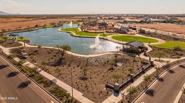 view of property location featuring a water and mountain view