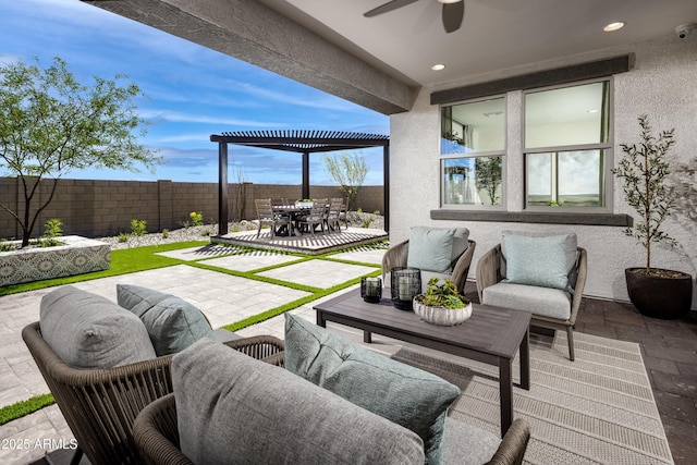 view of patio with a ceiling fan, a fenced backyard, outdoor dining space, an outdoor living space, and a pergola