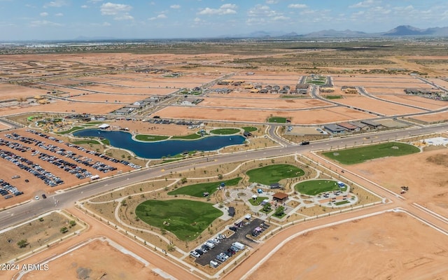 aerial overview of property's location featuring a water and mountain view