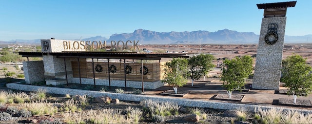 rear view of property with a mountain view