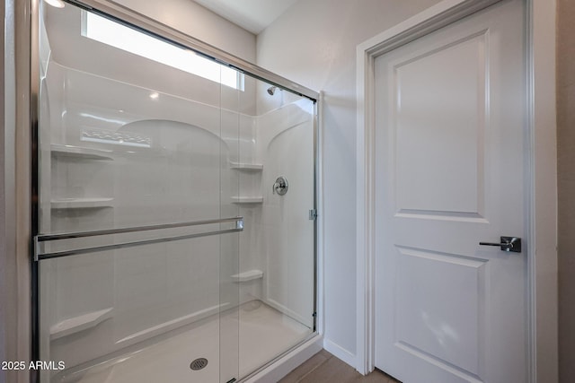 bathroom featuring walk in shower