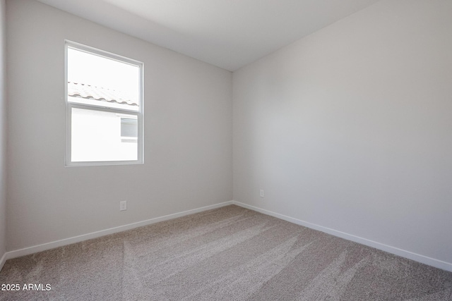 empty room featuring carpet flooring