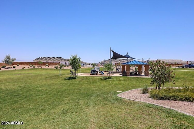 view of yard with a playground and a gazebo