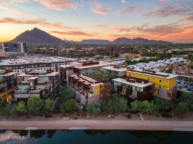 4745 N Scottsdale Rd Unit 3008, Scottsdale, AZ 85251 - aerial view at dusk featuring a mountain view