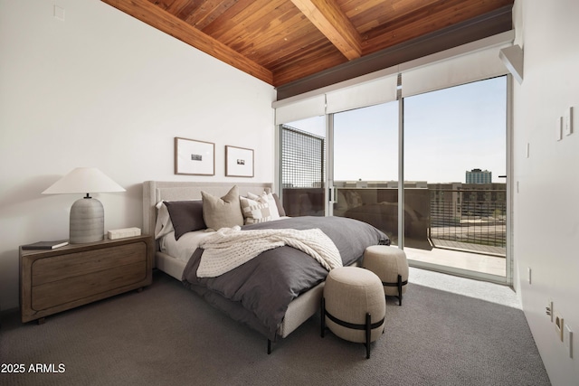 carpeted bedroom featuring beam ceiling, wooden ceiling, and access to outside