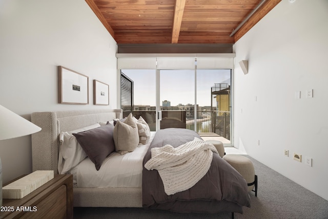 carpeted bedroom featuring lofted ceiling with beams, wooden ceiling, and access to outside