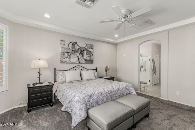 bedroom with ceiling fan and carpet floors