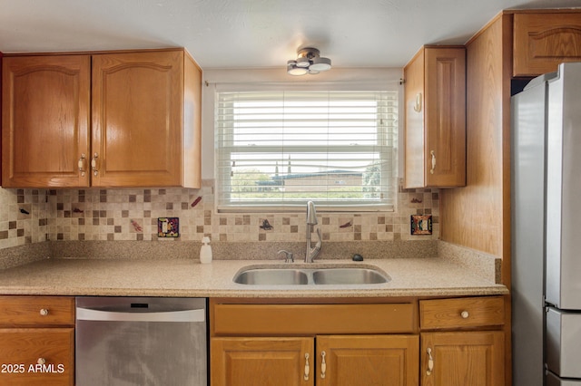 2001 Golf Links Rd, Sierra Vista, AZ 85635 - kitchen featuring stainless steel appliances, a sink, decorative backsplash, and light countertops