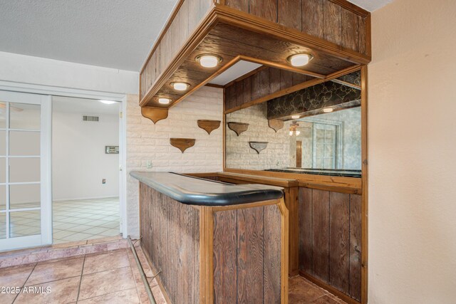 2001 Golf Links Rd, Sierra Vista, AZ 85635 - indoor bar featuring light tile patterned floors and a textured ceiling