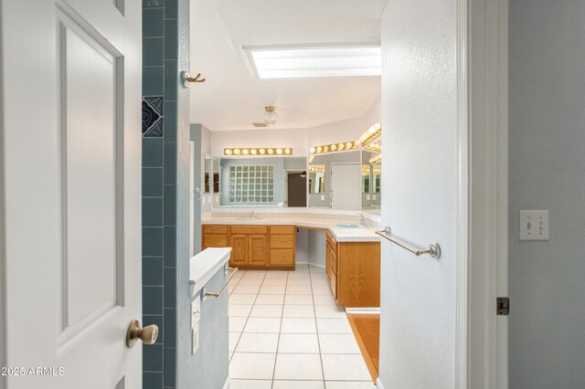 2001 Golf Links Rd, Sierra Vista, AZ 85635 - bathroom featuring double vanity and tile patterned floors