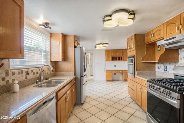 2001 Golf Links Rd, Sierra Vista, AZ 85635 - kitchen with stainless steel appliances, a sink, decorative backsplash, light tile patterned flooring, and light countertops
