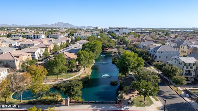 bird's eye view featuring a water and mountain view