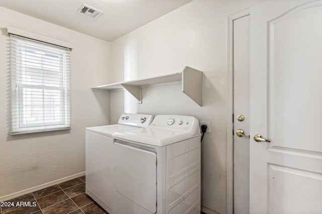 laundry room with washing machine and dryer