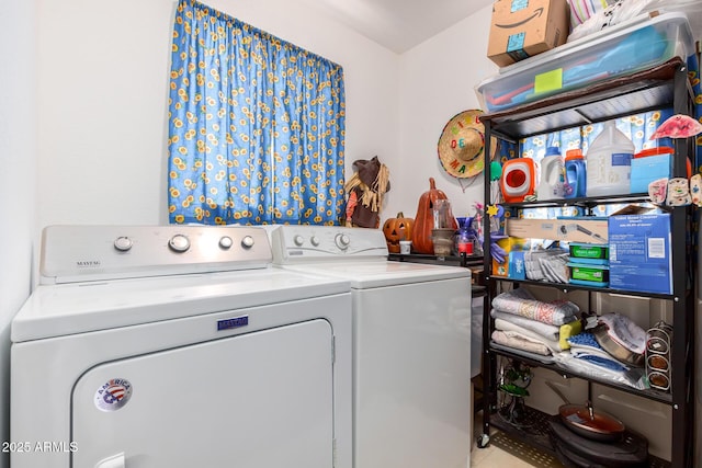 clothes washing area featuring washing machine and dryer