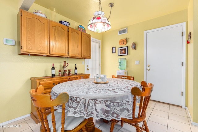 dining room with light tile patterned floors