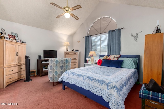 bedroom featuring ceiling fan, vaulted ceiling, a textured ceiling, and carpet