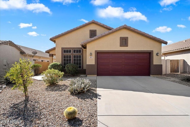 view of front of property featuring a garage