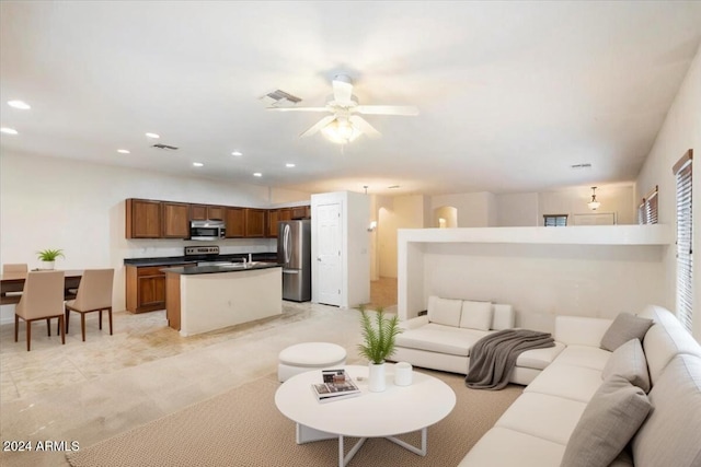 living room featuring ceiling fan