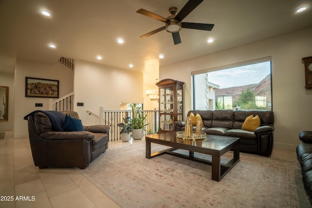 living room featuring recessed lighting, light tile patterned flooring, and a ceiling fan