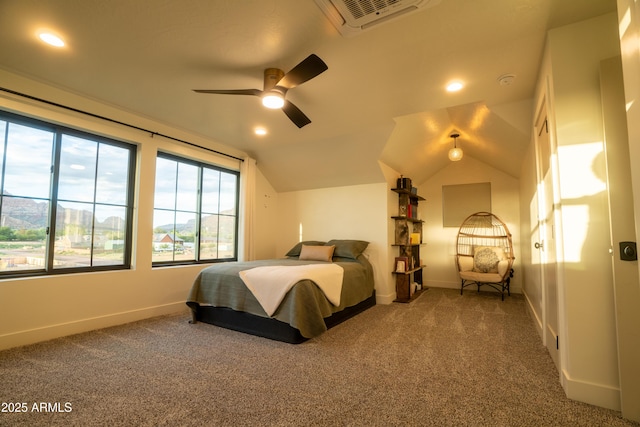 carpeted bedroom featuring vaulted ceiling, recessed lighting, visible vents, and baseboards