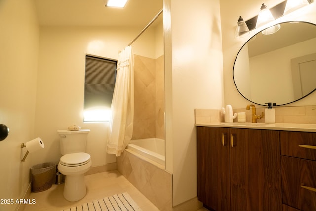 full bath with vanity, baseboards, tile patterned flooring, toilet, and tiled shower / bath