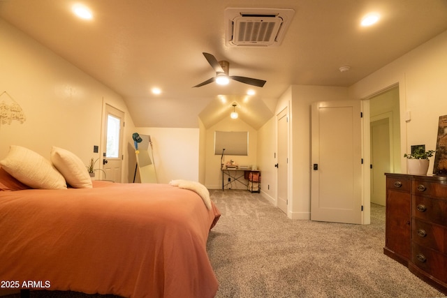 bedroom with a ceiling fan, baseboards, visible vents, vaulted ceiling, and light carpet