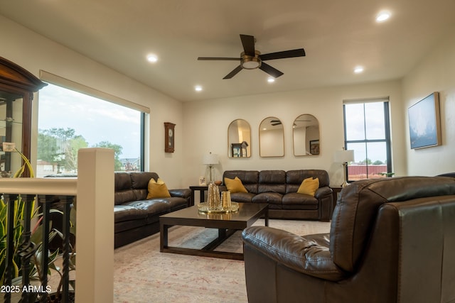 living room with plenty of natural light, recessed lighting, and ceiling fan