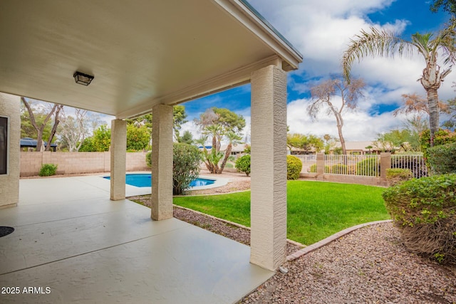 view of patio / terrace with a fenced in pool and a fenced backyard