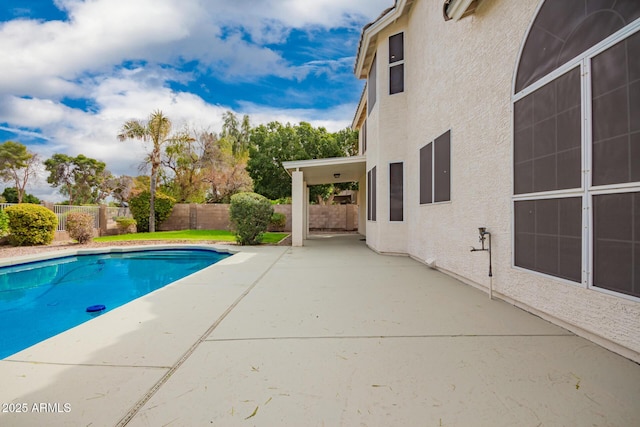 view of swimming pool with a patio, a fenced backyard, and a fenced in pool