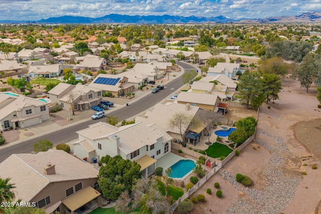 bird's eye view featuring a mountain view and a residential view