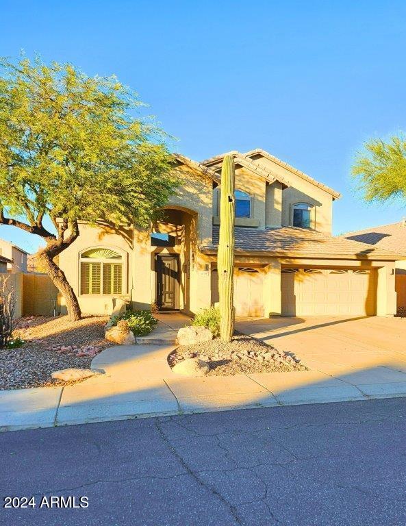 view of front of house with a garage