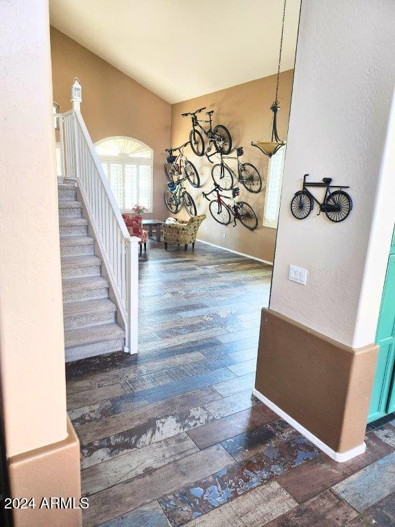 entrance foyer with dark hardwood / wood-style floors