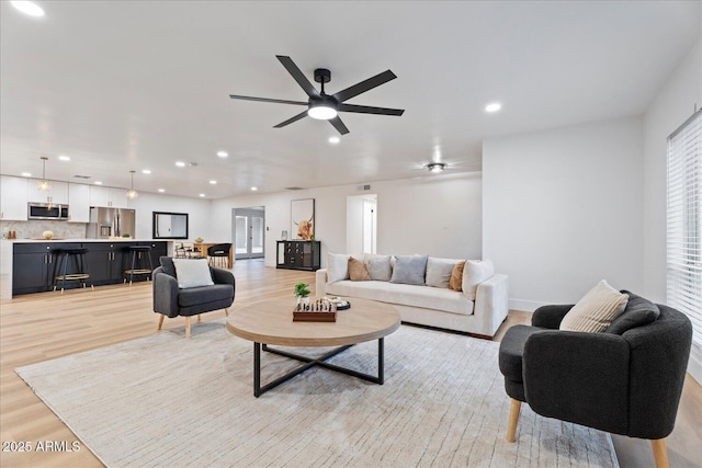 3506 W Yucca St, Phoenix, AZ 85029 - living area with light wood finished floors, recessed lighting, and ceiling fan