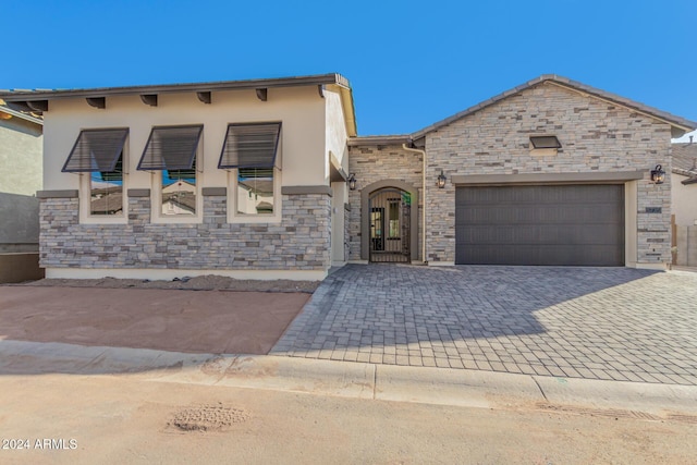 view of front of home with a garage