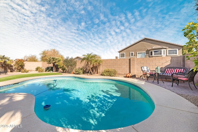 view of pool with a patio area