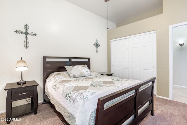 carpeted bedroom with a closet