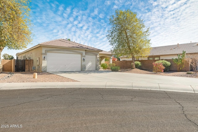 ranch-style house featuring a garage